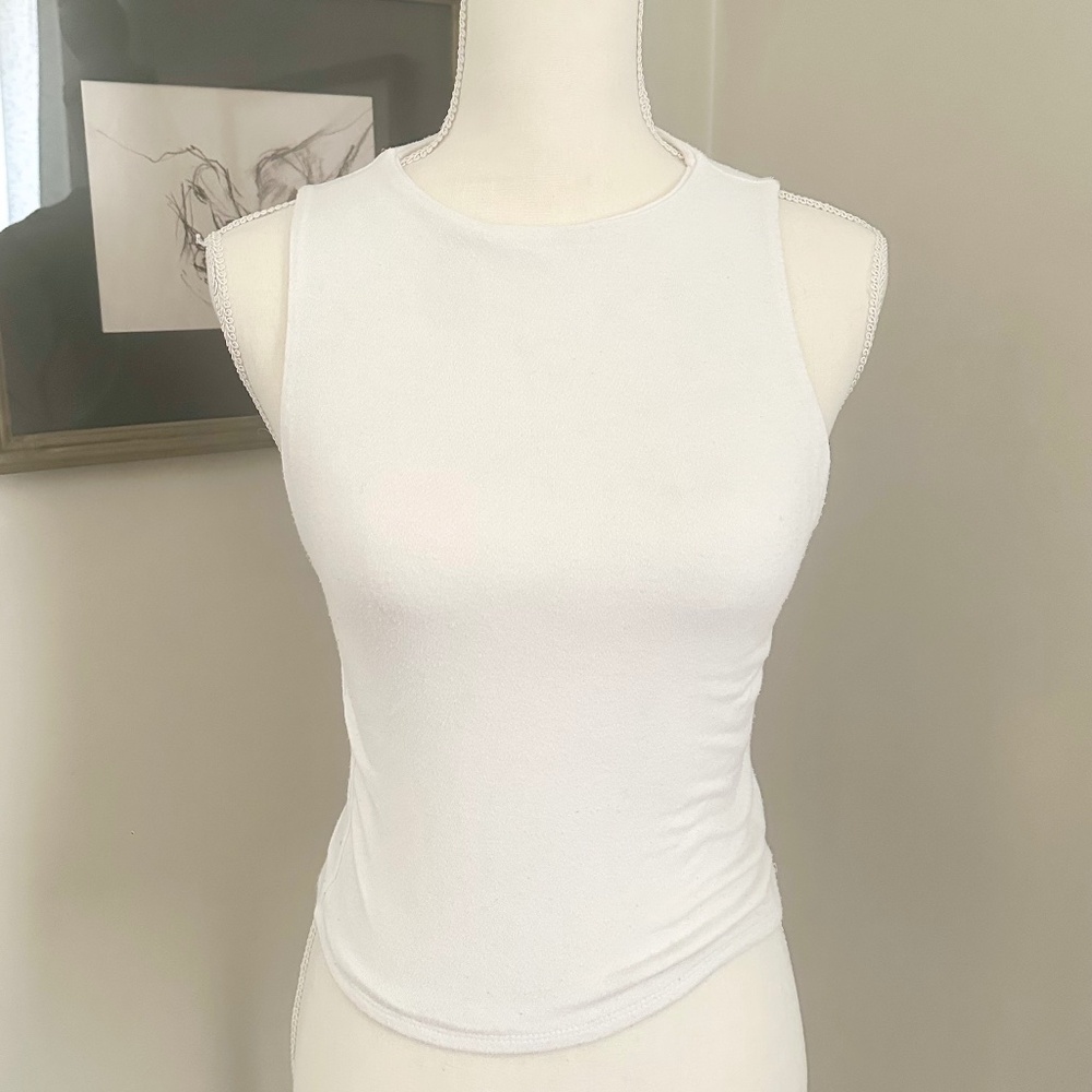 White sleeveless high crew neck slightly cropped knit tank top